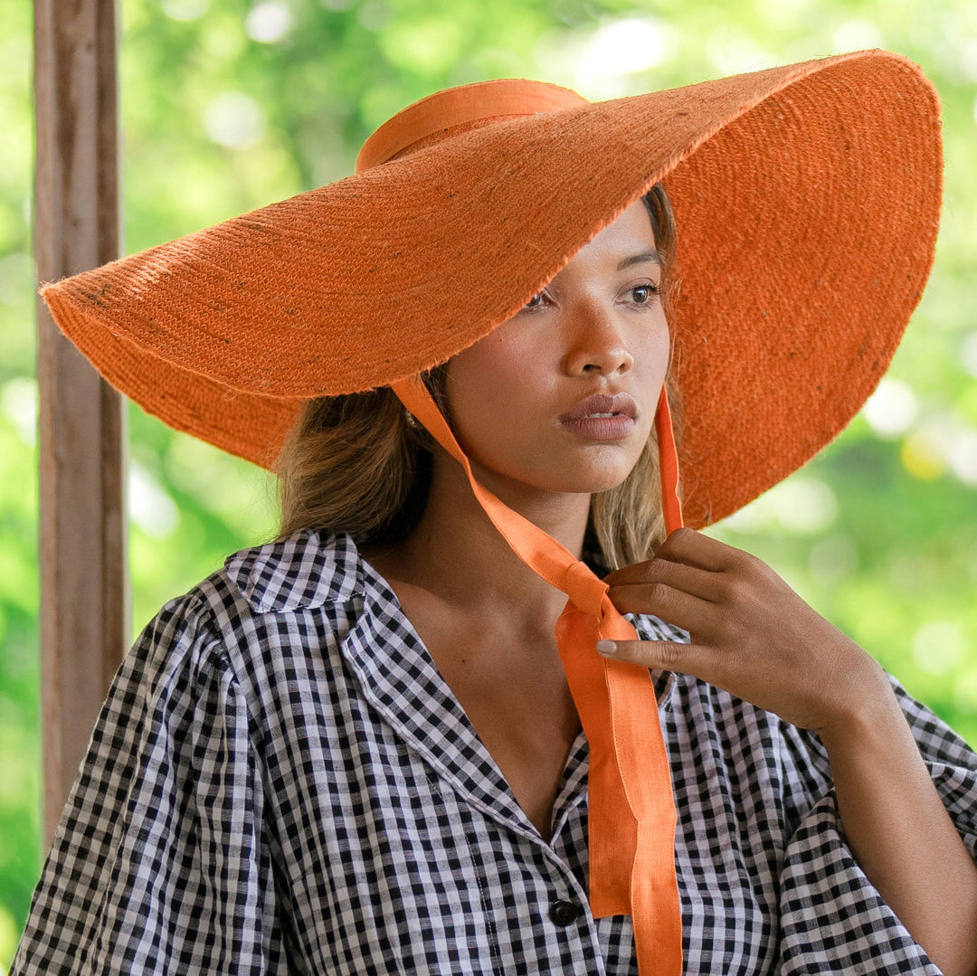 LOLA Wide Brim Jute Straw Hat In Orange by BrunnaCo