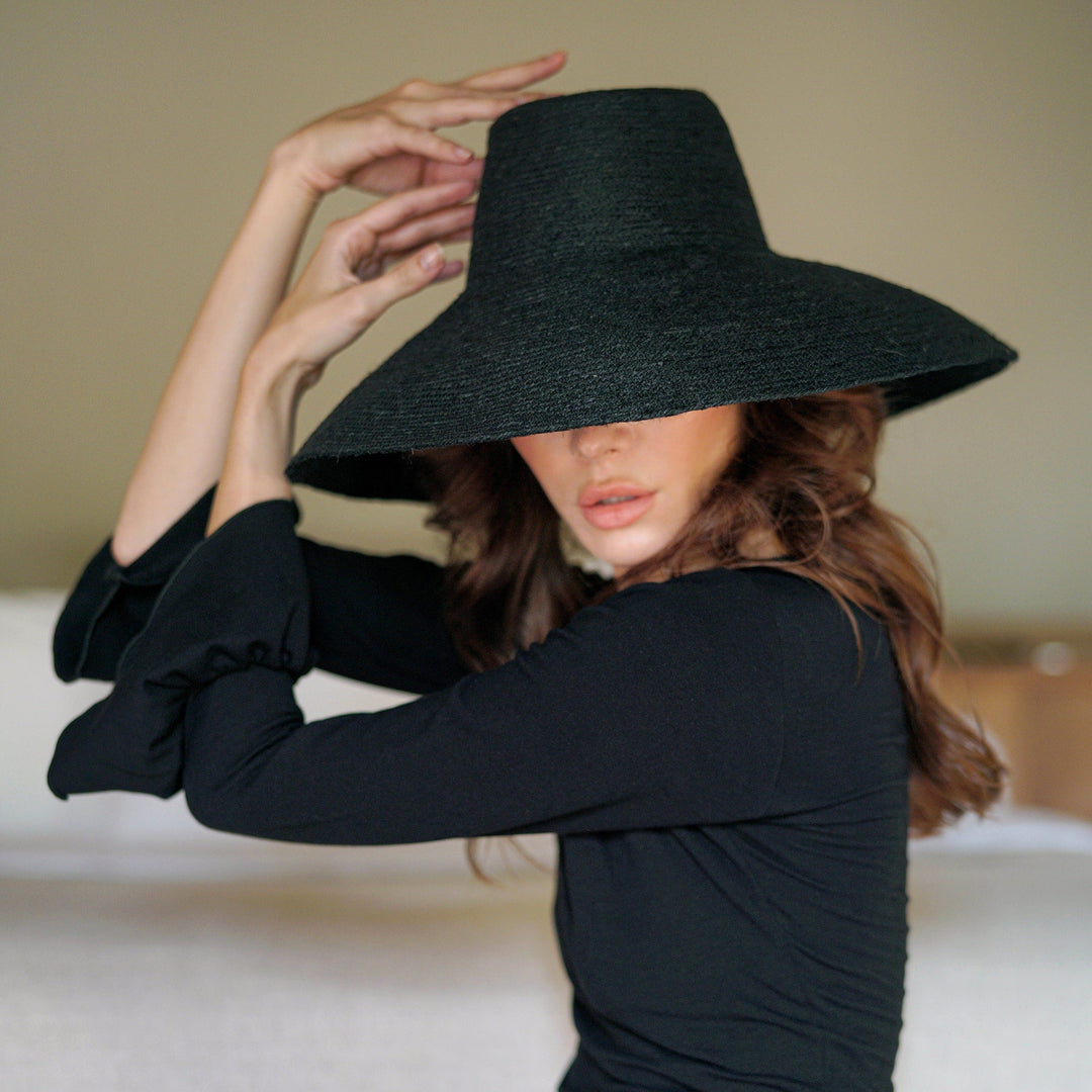 RIRI Jute Handwoven Straw Hat In Black by BrunnaCo